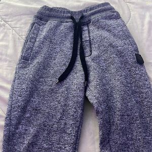Fashionable grey ish black sweats.